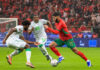 Hosts Morocco overcome Comoros in opening game