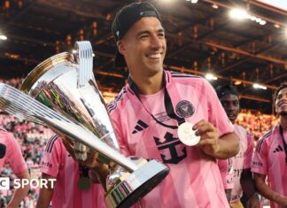 Luis Suarez: Former Liverpool and Barcelona striker signs new one-year contract with MLS side Inter Miami Luis Suarez of Inter Miami poses with the trophy after winning the Championship following the Audi 2025 MLS Cup Final