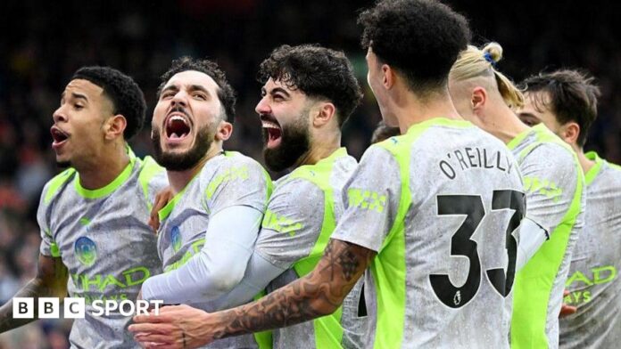 Manchester City players celebrate