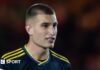 Rhys Bennett: Manchester United defender on father’s suicide Rhys Bennett playing for Manchester United in the Vertu Trophy
