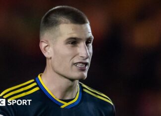 Rhys Bennett: Manchester United defender on father’s suicide Rhys Bennett playing for Manchester United in the Vertu Trophy