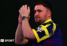 World Darts Championship 2026 results: Luke Littler joins Gary Anderson and Ryan Searle in semi-finals Luke Littler applauds