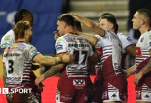 Wigan: ‘Scary’ and ‘ruthless’ Warriors in mood to regain Super League crown Wigan players congratulate number 17 Oli Partington on scoring a try against Leigh Leopards