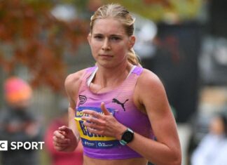 Leaders taken wrong way by guide vehicle in US Half Marathon Championship race Molly Born runs