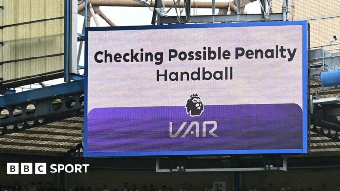VAR: FSA survey finds 75% of Premier League fans against A big screen display a VAR check for a possible penalty during a Premier League match