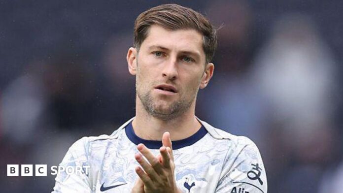 Ben Davies: Wales defender should have Tottenham Hotspur future - Ben Davies applauds in Spurs training kit