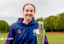 Former England spinner Kirstie Gordon named in Scotland World Cup squad Kirstie Gordon with the Women's T20 World Cup trophy
