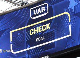 World Cup 2026: Is VAR being used differently to the Premier League? The big screen displays the VAR review after Iran's goal during the FIFA World Cup 2026 Group G match between Belgium and IR Iran at Los Angeles Stadium on June 21, 2026 in Inglewood, California.