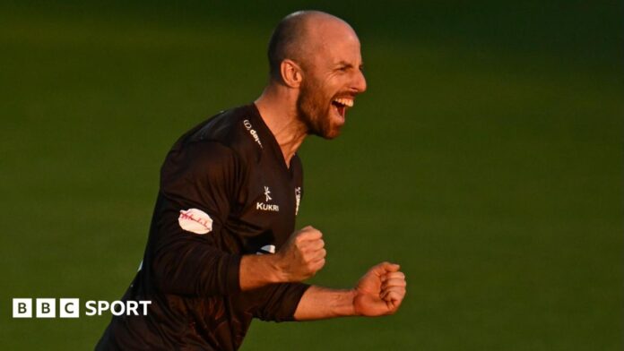 Jack Leach, wearing Somerset's black T20 shirt, celebrates taking a wicket against Worcestershire