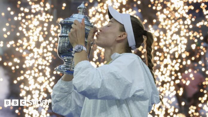 US Open 2026 results: Elena Rybakina beats Aryna Sabalenka to Elena Rybakina lifts the US Open trophy with Aryna Sabalenka looking on